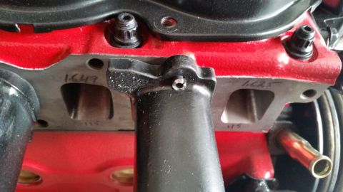 1981 Ford Bronco - Engine components are visible with handwritten markings on the metal casing.