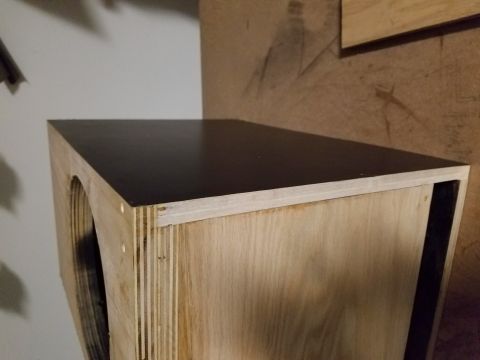 1994 Ford Bronco - A custom-built wooden enclosure, possibly for a speaker, is shown with a dark top surface.