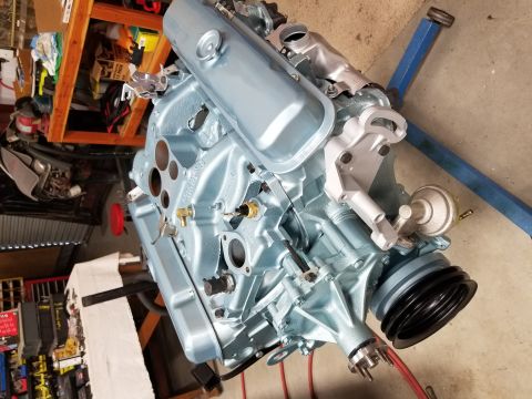 1969 Pontiac Firebird - Engine assembly on a stand, showing the front of the engine.