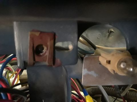 1985 Ford Bronco - Close-up view of interior wiring and a light bulb socket, with a watermark from Supermotors.net visible.