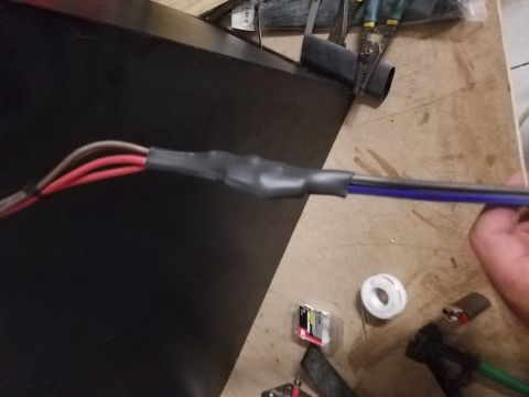 1994 Ford Bronco - Photograph of cables fitted with heat-shrink tubing, not a technical document.