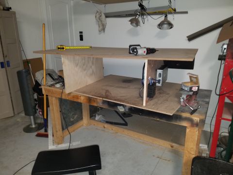 1994 Ford Bronco - Photograph of an enclosure under construction on a workbench, not a technical document.