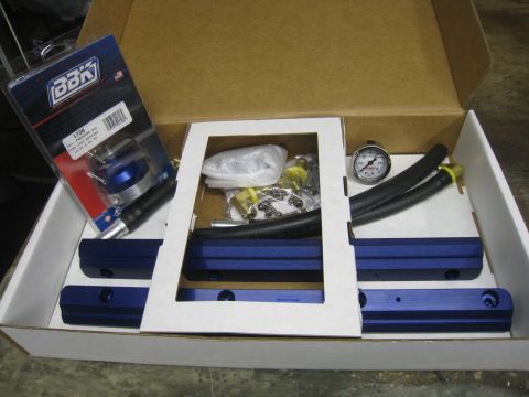 1996 Ford Bronco - A box containing a BBK fuel pressure regulator, fuel rails, and a fuel pressure gauge.