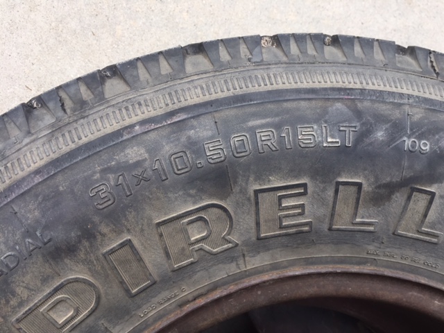 Pirelli tire showing size 31x10.50R15LT and load index 109