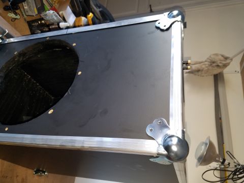 1994 Ford Bronco - Photo of a black road-case speaker box with aluminum corner hardware, not a technical document.
