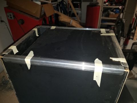 1994 Ford Bronco - Photo of a black road-case enclosure with masking tape during assembly, not a technical document.