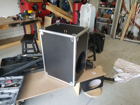 1994 Ford Bronco - Photo of a road-case speaker enclosure with a driver cutout, not a technical document.