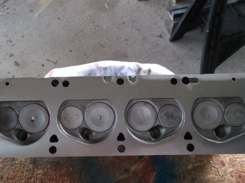 Aluminum V8 engine cylinder head with intake and exhaust valves