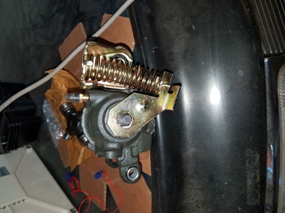 Brake caliper assembly with yellow spring