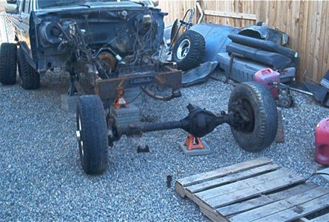 1986 Ford Bronco - I got 4 8 lug rollers from a local yard to hold the project up. I figured it would be a hell of alot easier to manuever the beast this way.