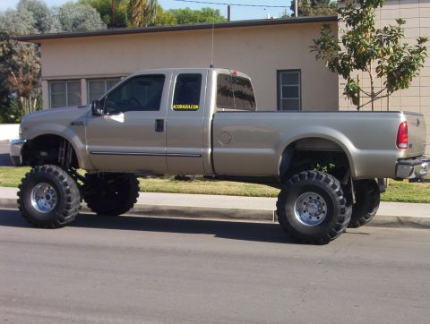 2000 Ford F-450 - AFTER I PUT THE NEW FRONT SPRINGS 2 DAYS BEFORE GLAMIS THANKSGIVING 03