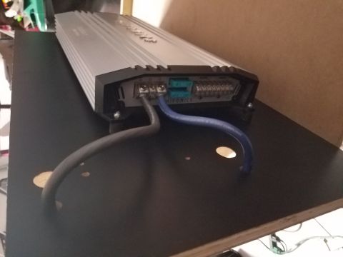 1994 Ford Bronco - Car amplifier with connected power and speaker wires.
