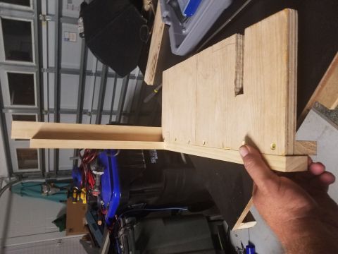 1994 Ford Bronco - A wooden jig is positioned over the interior of a blue vehicle, with a Supermotors logo visible at the bottom right.