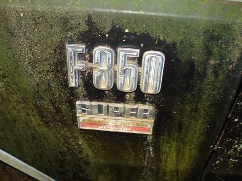 1967 Ford F-250 - The "F350" and "Super Camper Special" badges are visible on the side of a weathered vehicle.