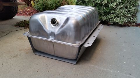 1985 Ford Bronco - Fuel tank shown outside of a vehicle, likely for replacement or repair.