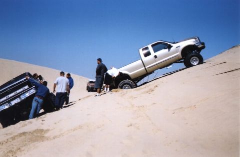 2000 Ford F-450 - I climbed the hill and cut the brake front brake lines with the fence to help save tony's truck. I drove home with no front brakes.