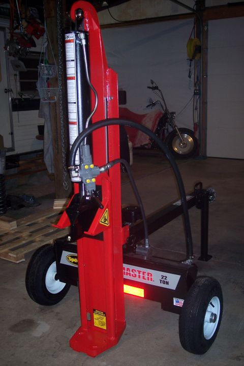 1995 Ford Bronco - A red log splitter with 'MASTER 22 TON' branding is shown in a garage setting.