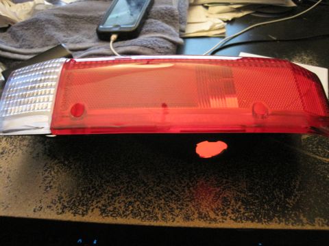 1989 Ford Bronco - A red and clear taillight assembly is shown, likely a replacement part.