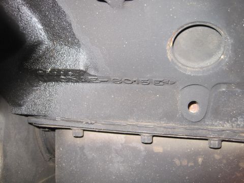 1989 Ford Bronco - Close-up of an engine block casting showing stamped identification numbers.