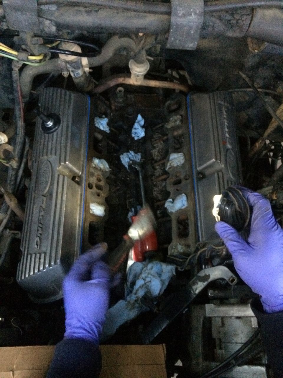 Ford Racing valve covers during engine reassembly