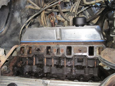 1989 Ford Bronco - Close-up view of an engine's internal components during reassembly.