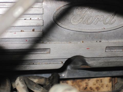 1989 Ford Bronco - A Ford engine part is visible in this close-up view.