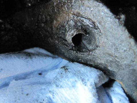 1989 Ford Bronco - A detailed view of a greasy engine part, possibly from a Ford Bronco, is shown on blue towels.
