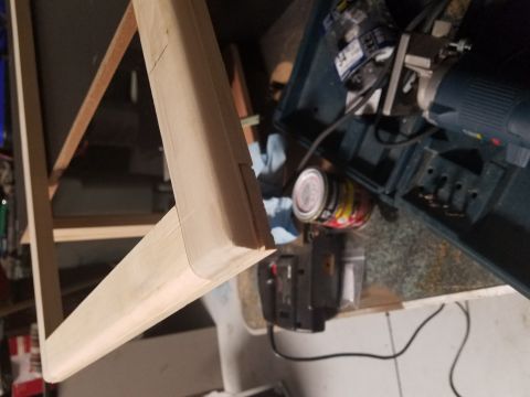 1994 Ford Bronco - Wooden frame assembly with woodworking tools and supplies visible in the background.