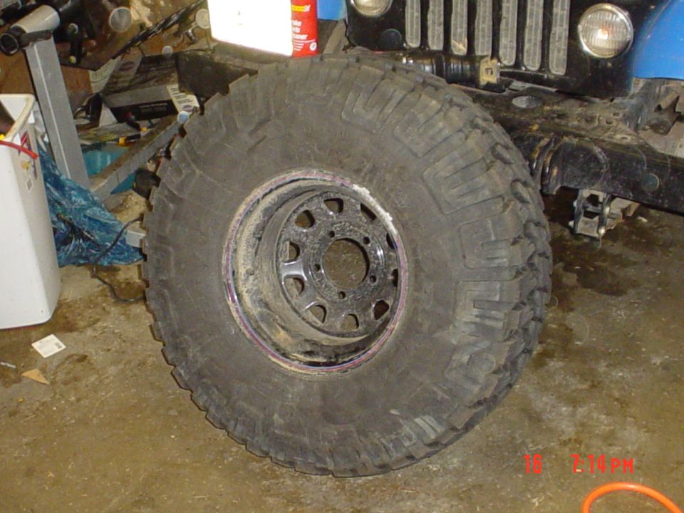 Off-road tire and wheel with black rim