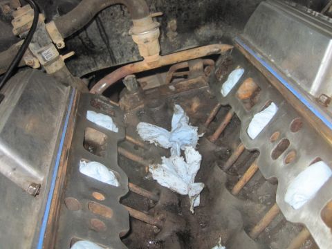 1989 Ford Bronco - Engine block with rags stuffed into cylinders during reassembly.