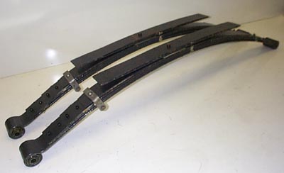 1994 Ford Bronco - Two black leaf springs are shown against a white background.