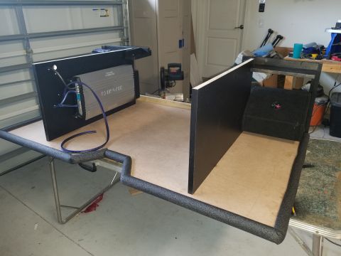 1994 Ford Bronco - Custom speaker box build in progress, showing amplifier and frame construction.