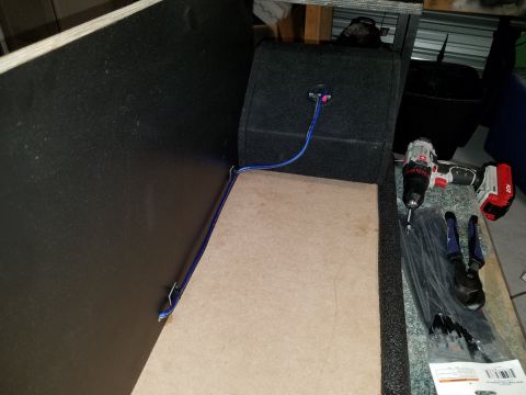 1994 Ford Bronco - Tools and a speaker box are laid out, possibly for installation or repair.
