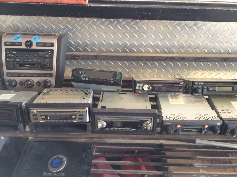 Assortment of car stereos on shelves