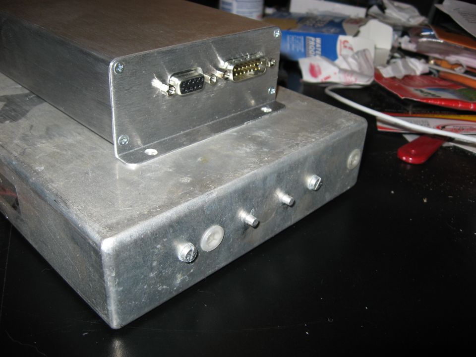 Two aluminum electronic enclosures with DB9 and DB25 connectors