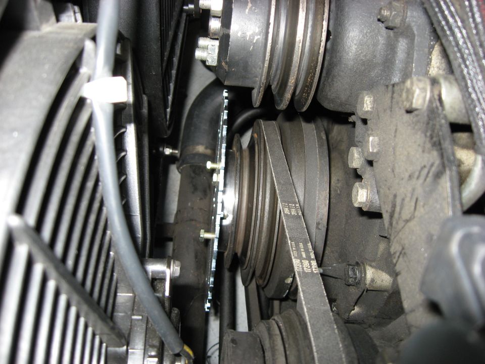 Engine bay view of V-belt and pulleys on a Jaguar XJ6