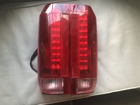 1989 Ford Bronco - This red LED tail light assembly features a clear lower section for reverse lights.