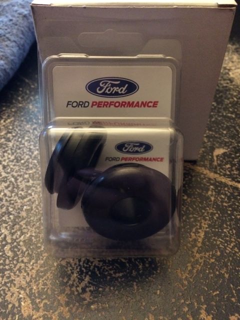 1989 Ford Bronco - Two rubber parts are shown in their Ford Performance packaging, indicating they are aftermarket components.