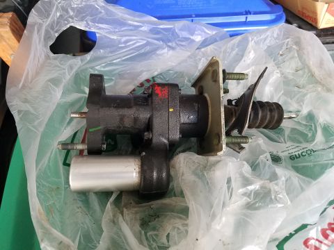 1994 Ford Bronco - This is a brake booster assembly, likely for a vehicle's braking system.