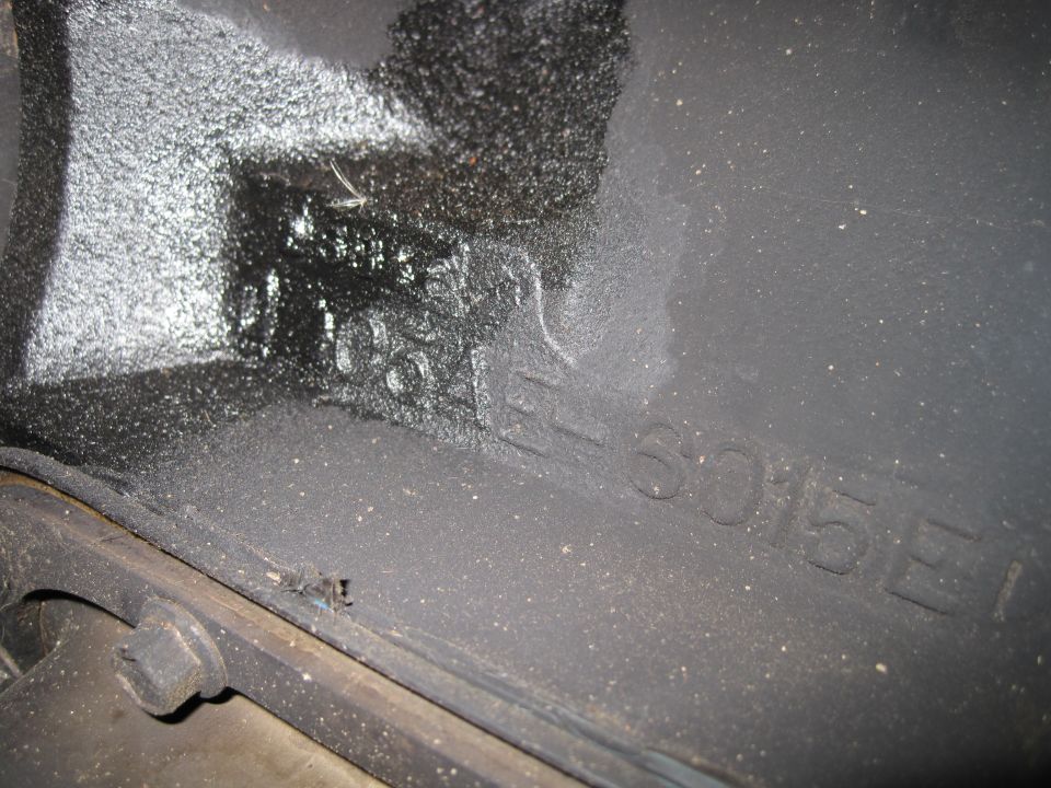 Close-up of an engine block with casting numbers visible