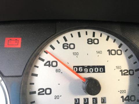 2003 Mercury Marauder - The speedometer indicates 40 mph, while the odometer displays 69,000 miles. The battery warning light is also active.