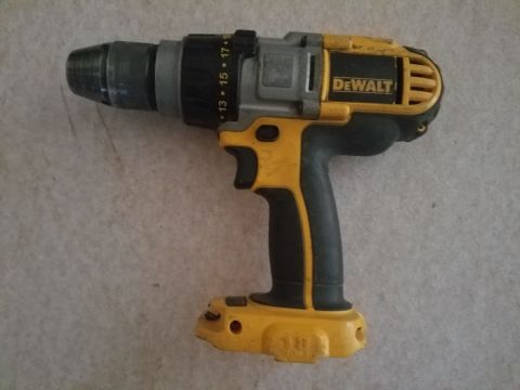 1990 Ford Bronco - A DeWalt cordless drill is shown against a neutral background.