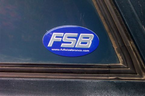 1995 Ford Bronco - A sticker with the website fullsizebronco.com is visible on the vehicle's dark paint.