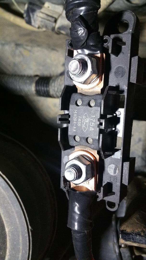 Ford alternator fuse holder with 175A rating and part number 14A094-AA