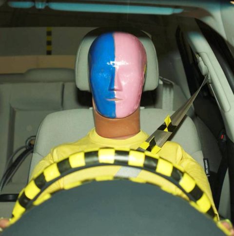 1971 Ford Ranchero - Crash test dummy is positioned in the driver's seat, secured by a seatbelt.
