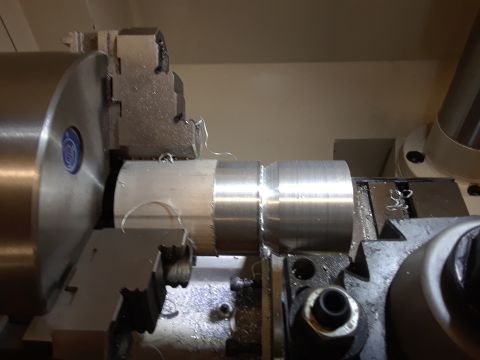 1994 Ford Bronco - Machining a metal component on a lathe.