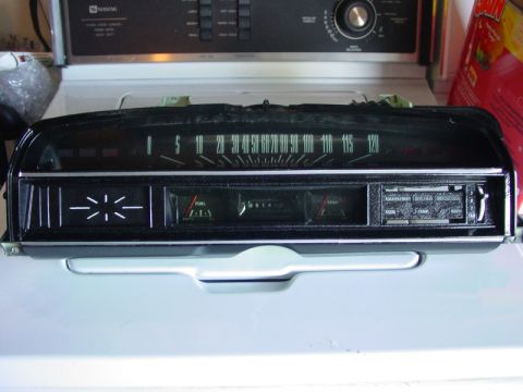 1971 Ford Ranchero - A vehicle's instrument cluster is shown, a speedometer and various gauges.