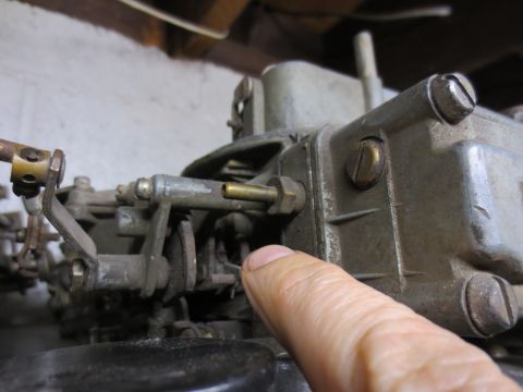 1967 Ford F-250 - Carburetor part shown in detail, focus on mechanical components and fittings.