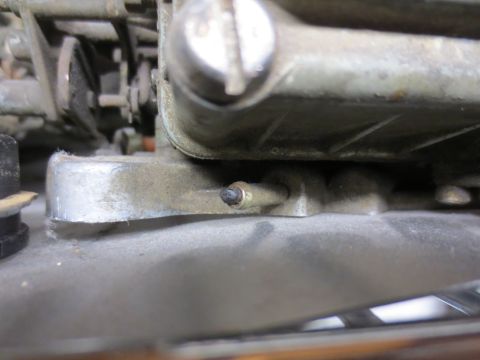 1967 Ford F-250 - A detailed view of a component within a vehicle's engine system, likely a carburetor.