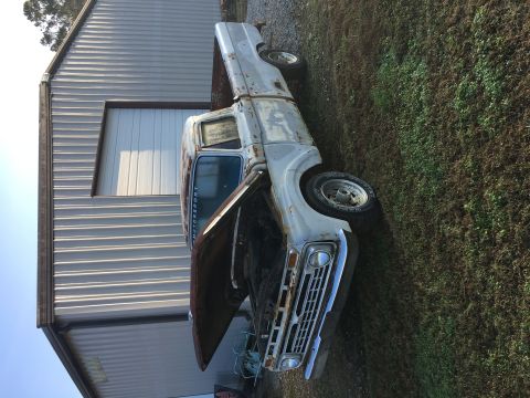 1967 Ford F-250 - This 1967 Ford F-250 pickup truck is in weathered condition and parked outdoors.